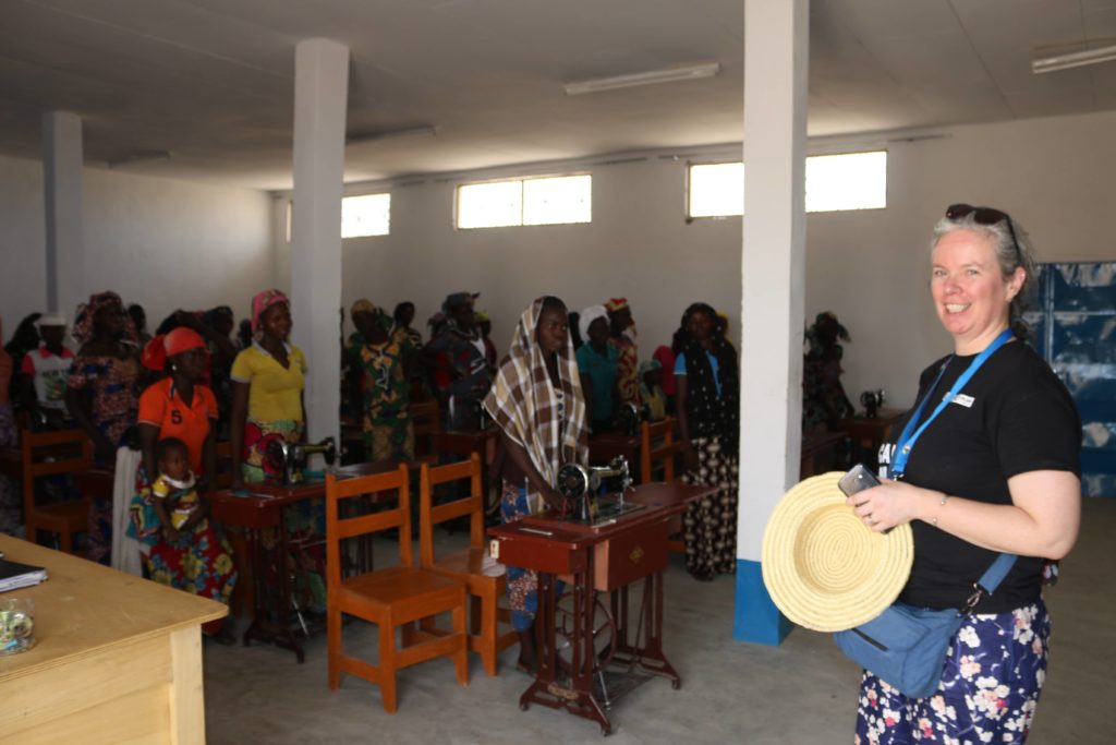 Anne Marie McCarthy in Cameroon meeting young women who are learning to sew
